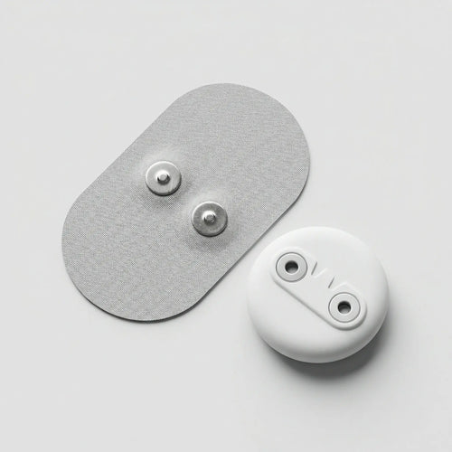 Electrode pad and device on a light gray background