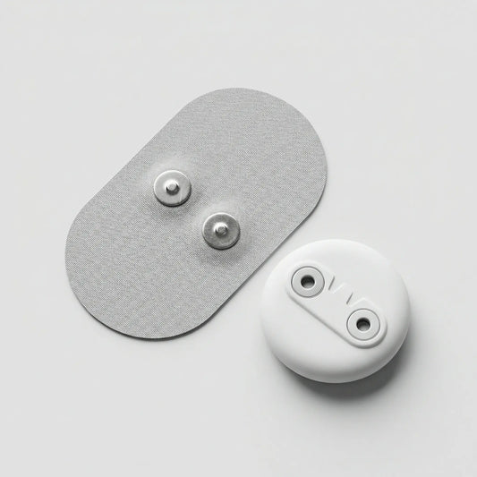 Electrode pad and device on a light gray background